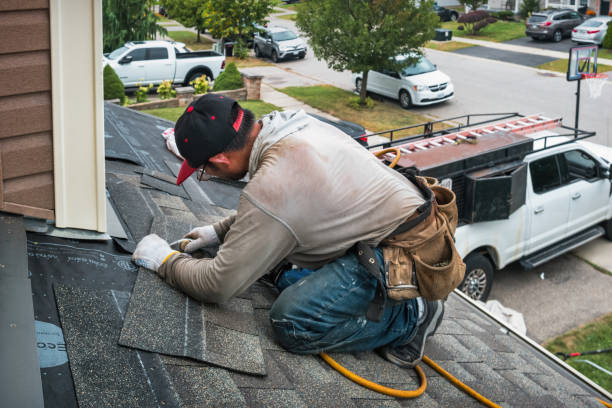 Professional Roofing technician working in Trafalgar, IN